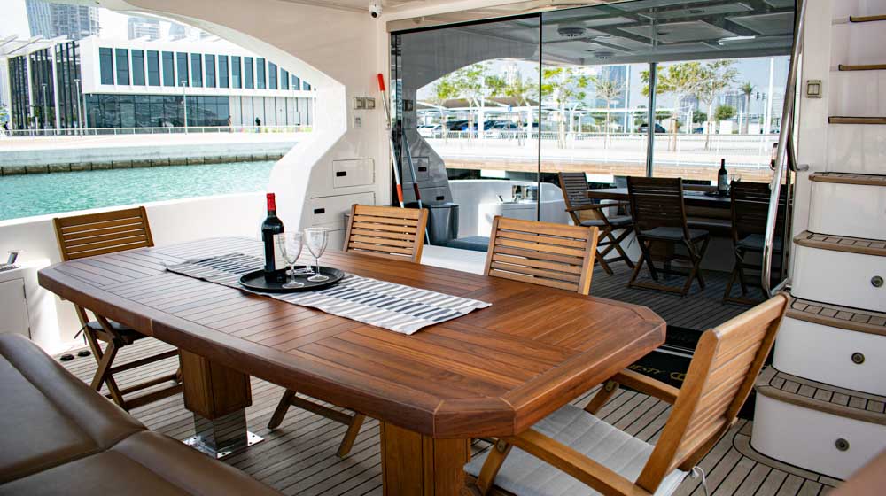 outdoor dining onboard a private yacht Dionysos